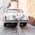 Dekoracje samochodu ślubnego